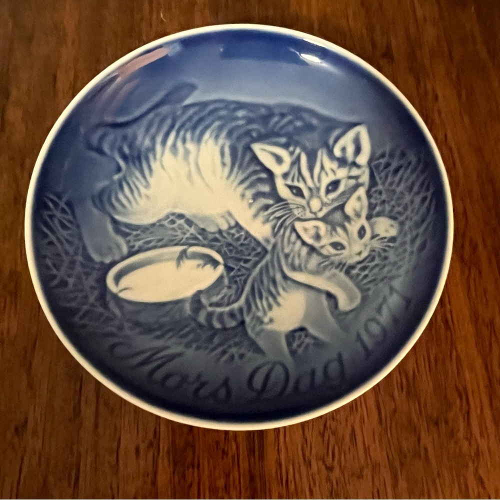 This is a Bing & Grondahl Mother's Day plate with cats blue and white.